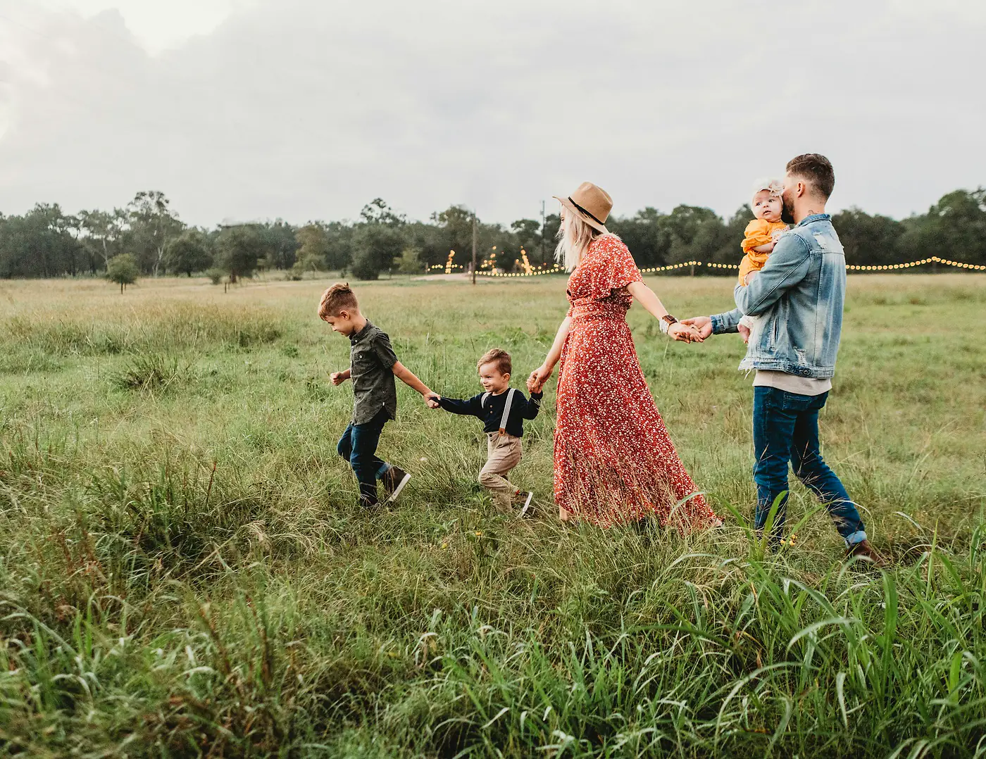 Family walking together in a field